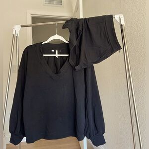 Travis Mathew black bell sleeve sweater